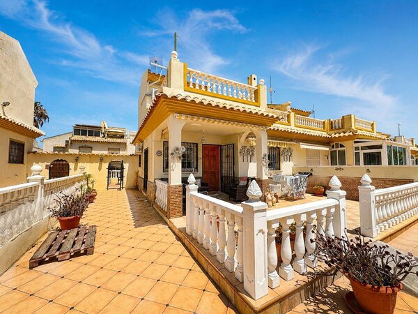 Spacious 3-Bedroom Townhouse with Communal Pool and Private Solarium near La Zenia Boulevard